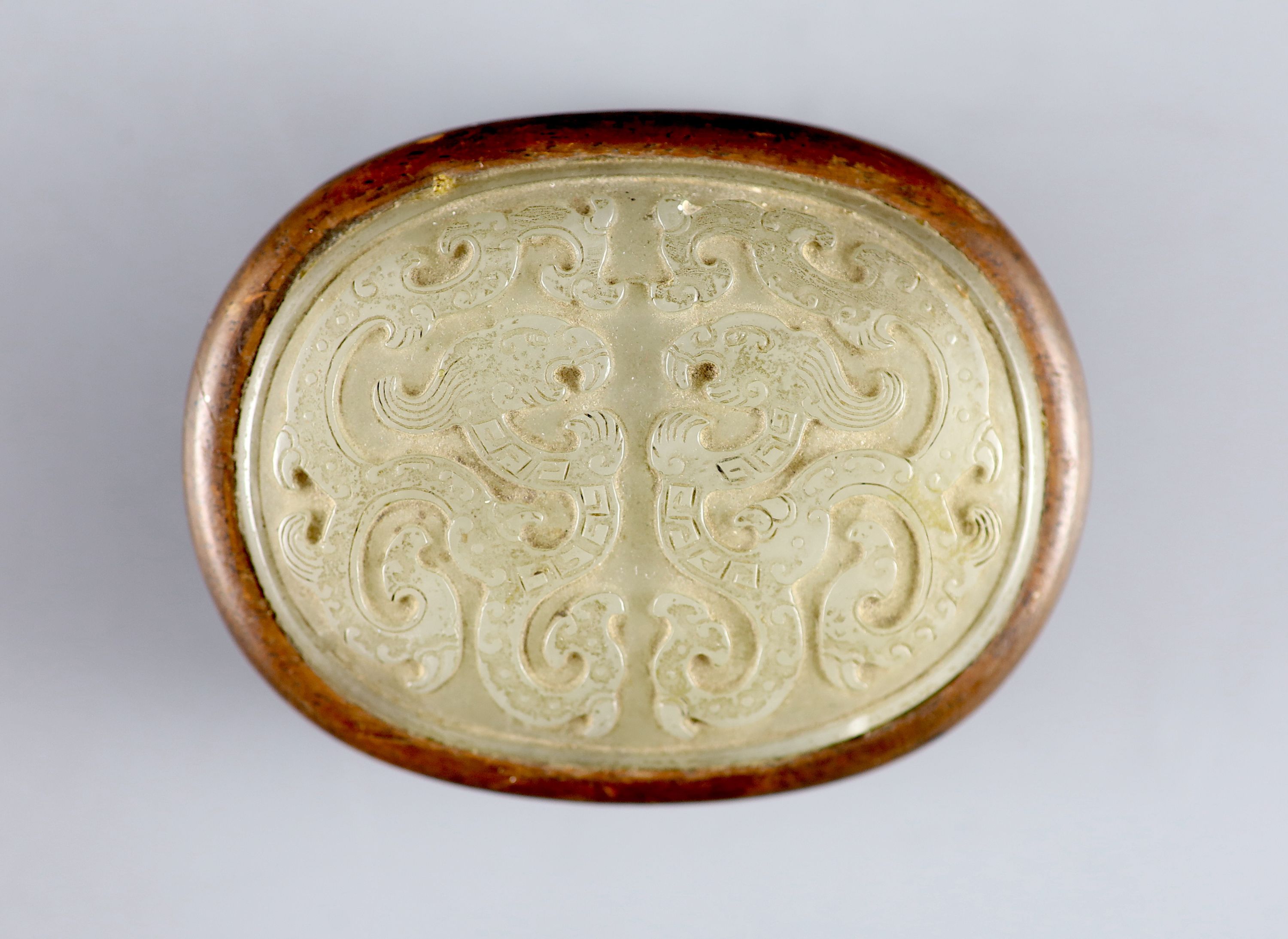 A Chinese pale celadon jade mounted box, 18th/19th century, 9cm wide